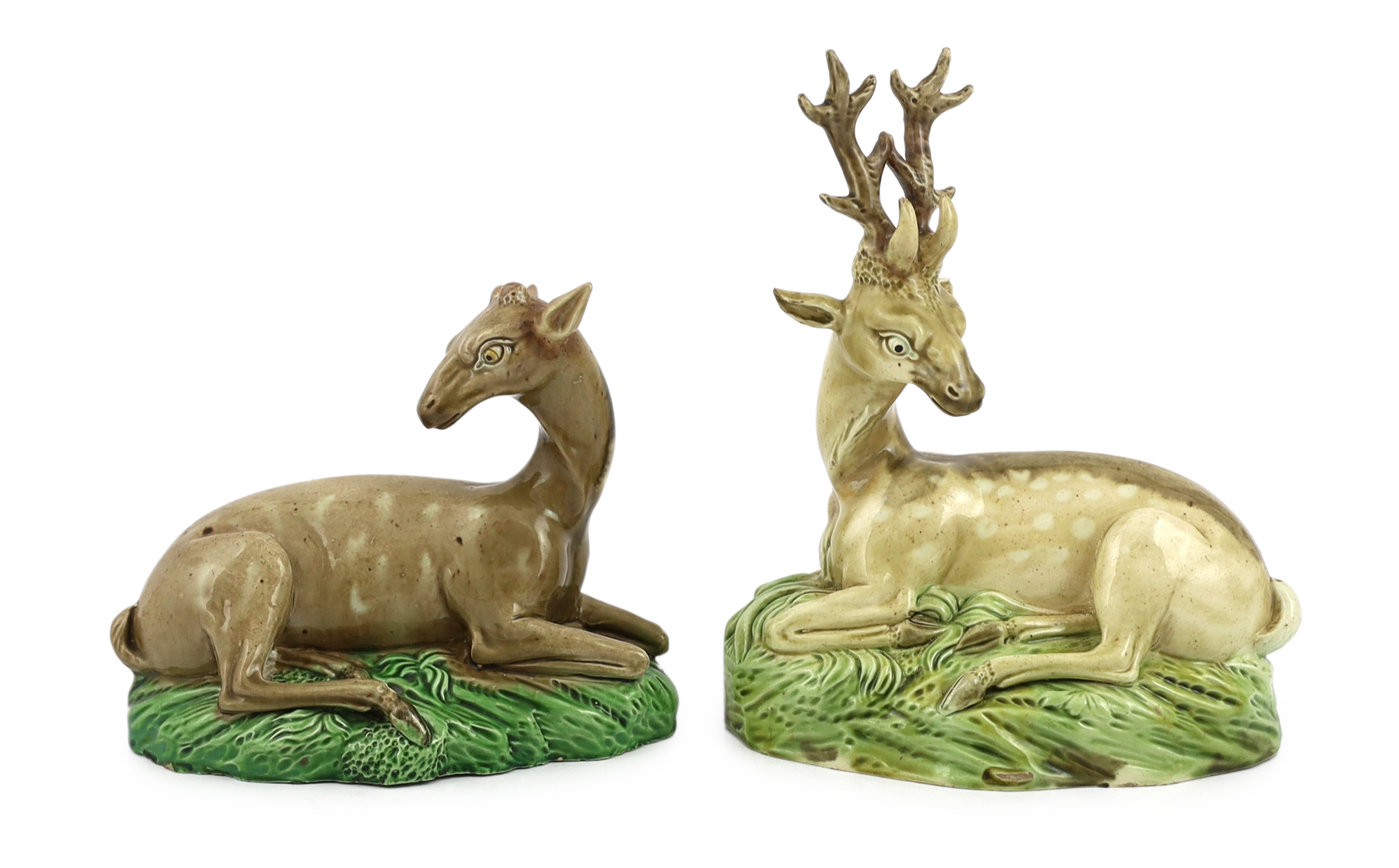 A near pair of Ralph Wood type figures of a Stag and Hind, c.1790, some restoration